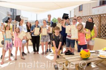 A group of English students who have completed their language course