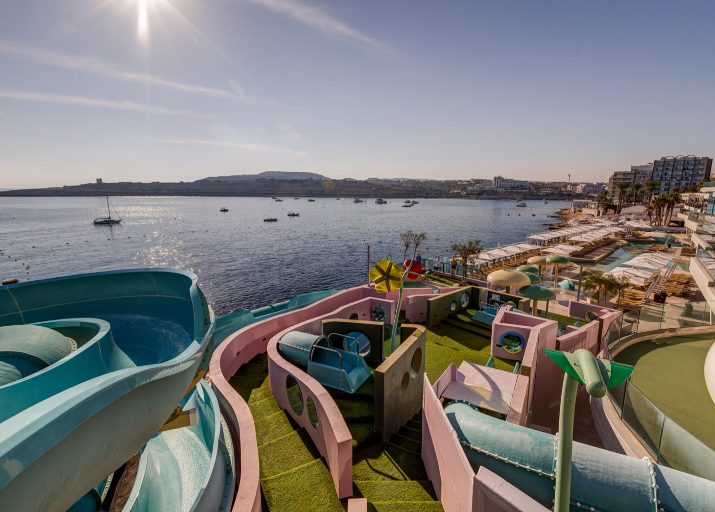 AX ODYCY Hotel rooftop water park overlooking St Paul's Bay — the Rezidence Superior for 16–17s